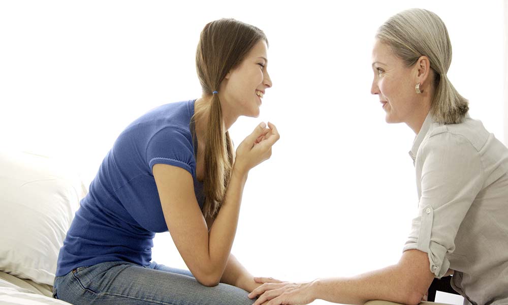 Mom and teenager in conversation