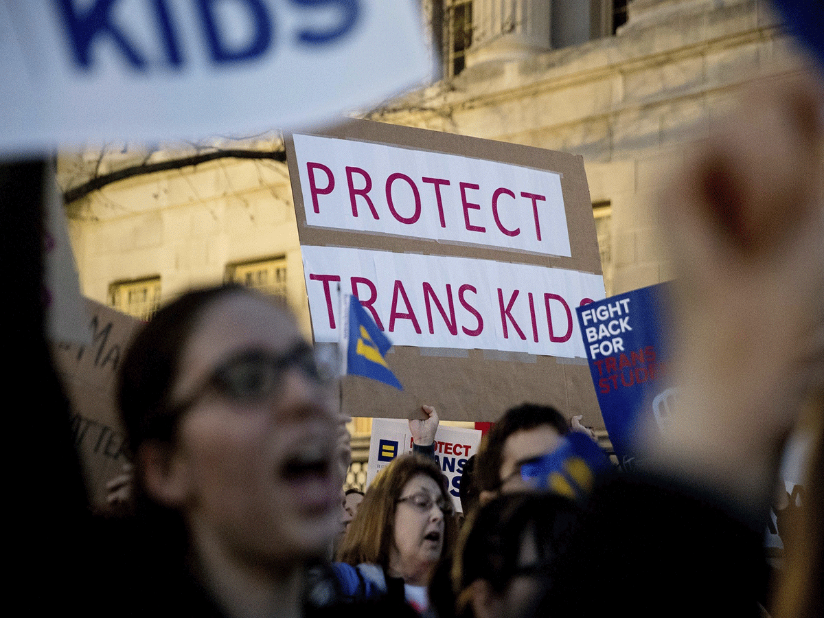 People against the president's decision, protest for the rights of trans kids