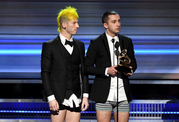 Josh Dun and Tyler Joseph of "Twenty One Pilots" appear onstage without pants to accept the award for best pop duo/group performance.
