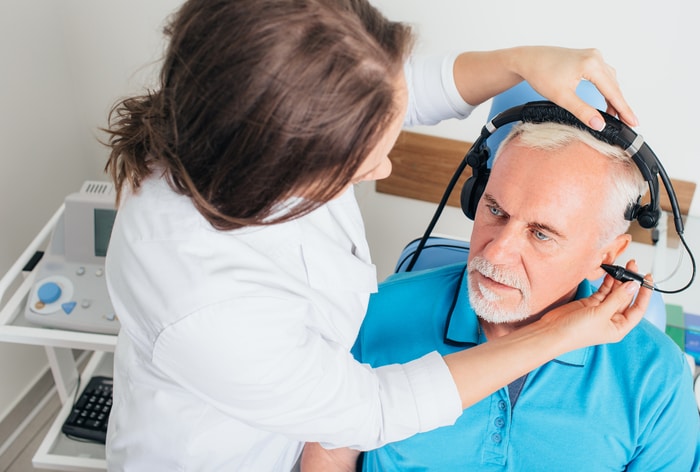 Senior Having An Audiology Exam